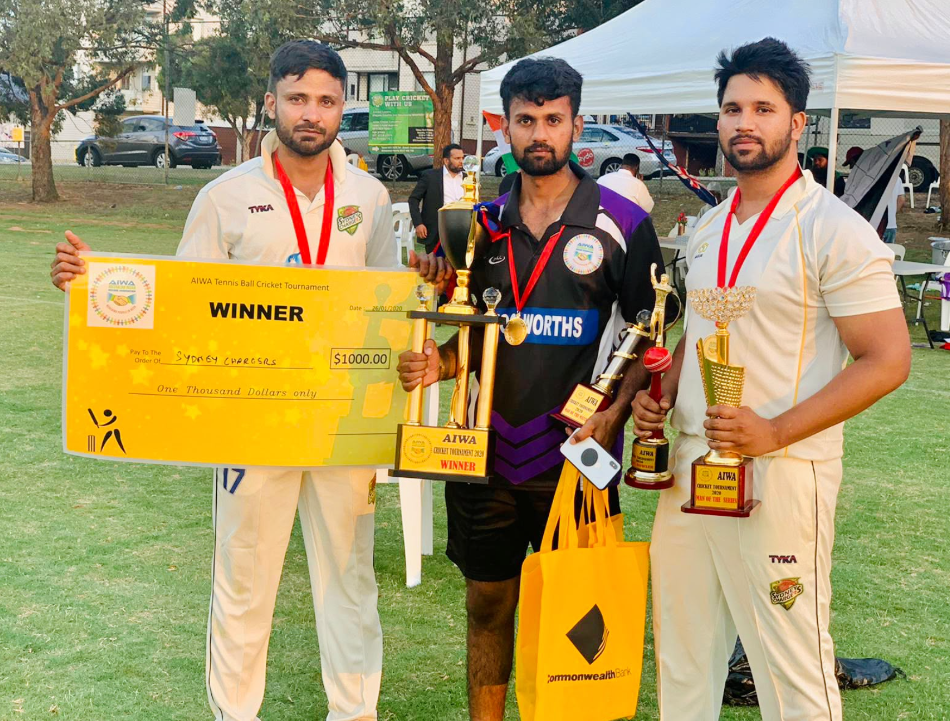 Sydney Chargers players with the AIWA 2020 winner cheque and trophies